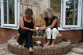 Shelling peas on the step