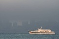 San Francisco skyscrapers disappear into the fog