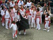 A childrens oss dancing on the harbour ramp